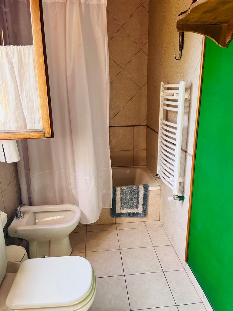 Encantadora cabaña en barrio residencial